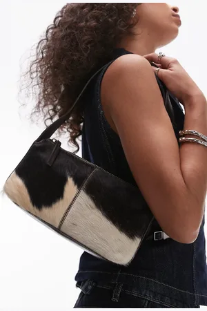 MANGO Cow print leather shoulder bag in