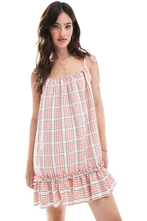 COLLUSION Drop hem mini dress in blush check