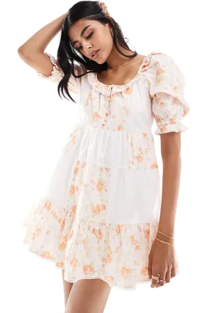 Miss Selfridge Tiered mini tea dress in patchwork broderie print