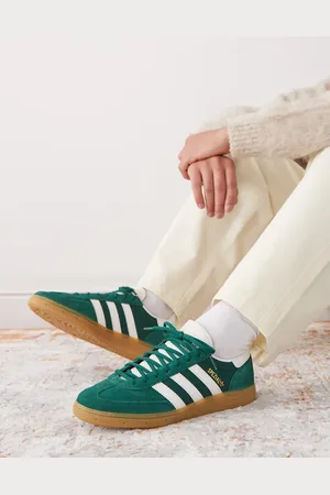 adidas Handball Spezial trainers in dark and white