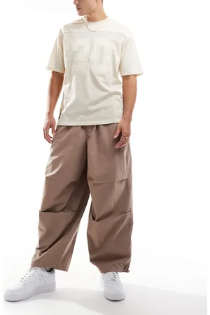 ASOS Oversized baggy parachute trouser in washed sand