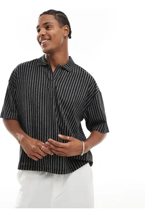 ASOS Oversized boxy polo shirt with texture in and white stripe