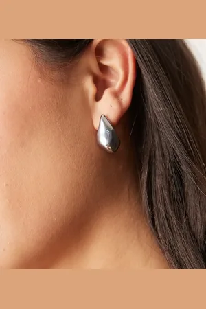 LOST SOULS Stainless steel chunky molten stud earrings in