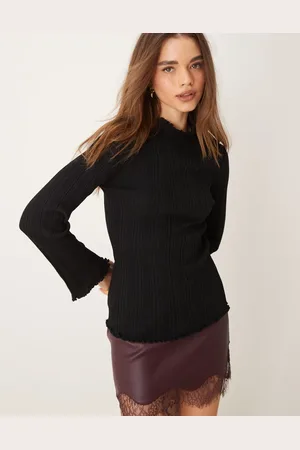 Gina Tricot Long sleeve ribbed knit top with fluted funnel neck and cuffs in