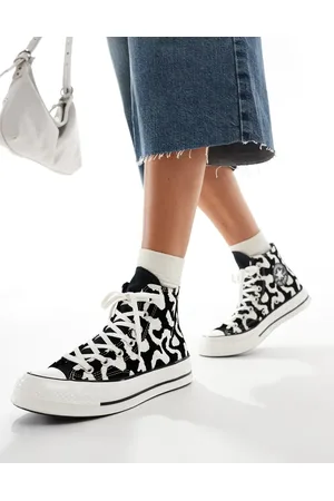 Converse Chuck 70 Hi trainers in and white cow print
