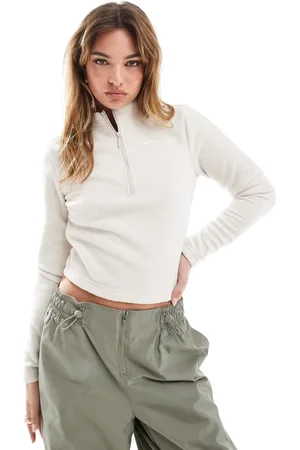 Nike Phoenix fleece 1/2 zip long sleeve top in beige