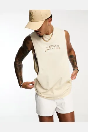 ASOS Relaxed fit vest in beige with Los Angeles chest print
