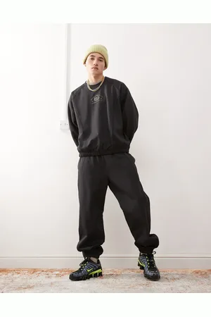 Weekday Co-ord oversized joggers with fantazy fussball graphic print and contrast seams in