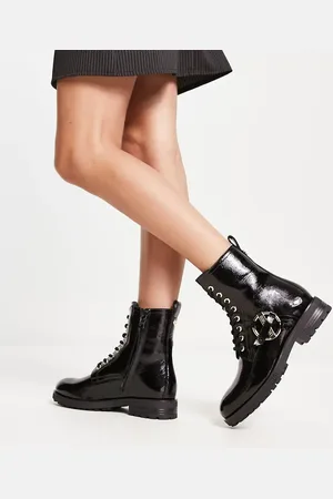 Moschino Lace up buckle boots in
