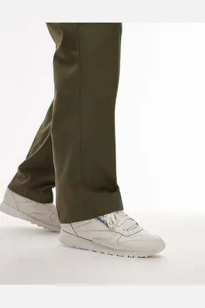 Reebok Classic leather trainers in and blue