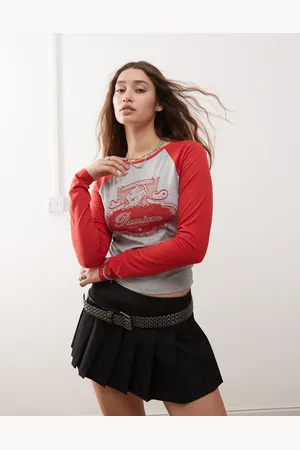 Daisy Street Varsity tiger print contrast sleeve baby tee