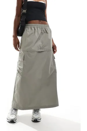Nike Woven 2 n 1 maxi and mini skirt with zip detail in