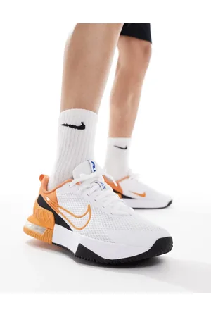 Nike Air Max Alpha 6 trainers in white and orange