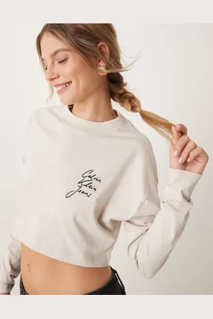 Calvin Klein Script logo crop long sleeve t-shirt in beige