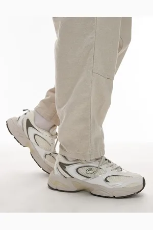 Lacoste Storm 96 2K trainer in off /khaki
