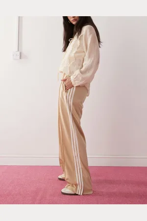 adidas Firebird Loose track pants in beige