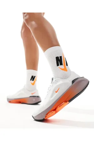 Nike Versair trainers in and orange