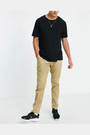 Nike Dri-FIT slim chino trousers in beige