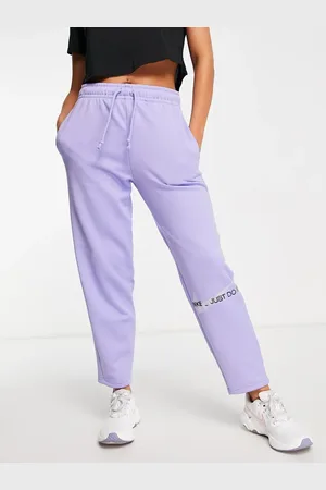 Nike Therma-FIT logo joggers in lilac