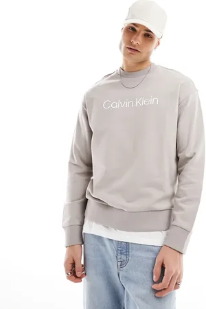 Calvin Klein Hero logo comfort sweatshirt in beige
