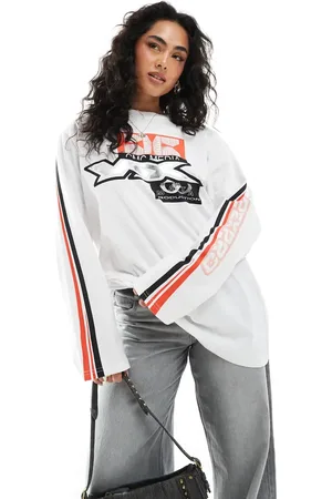 Monki Oversized long sleeve top with motocross print in