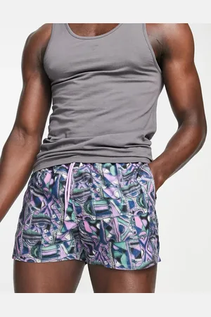 ASOS Swim shorts in short length with retro print in