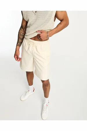 ASOS Swim shorts in long length in beige
