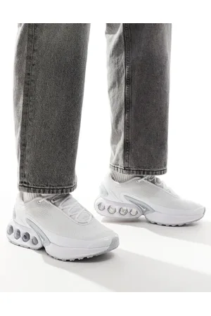 Nike Air Max DN trainers in and metallic silver