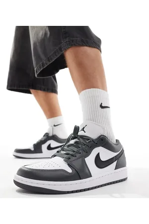 Jordan Nike Air 1 Low trainers in white and