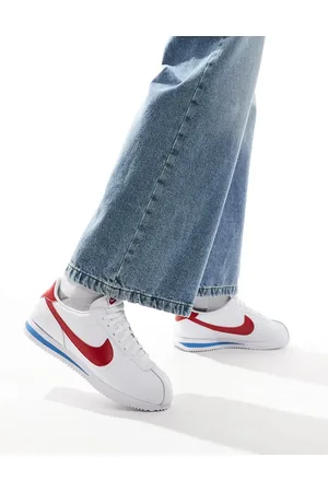 Nike Cortez trainers in and varsity red