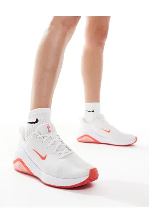 Nike Air Zoom Bella 7 trainers in and pink