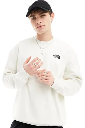 The North Face Essential oversized fleece sweatshirt in off Exclusive at ASOS