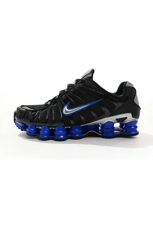 Nike Shox TL trainers in and metallic silver