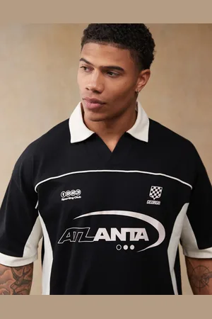 ASOS Oversized polo with cut and sew panelling and sports graphics in
