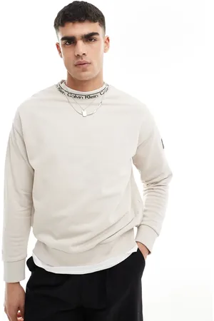 Calvin Klein Running logo comfort sweatshirt in beige - exclusive to ASOS