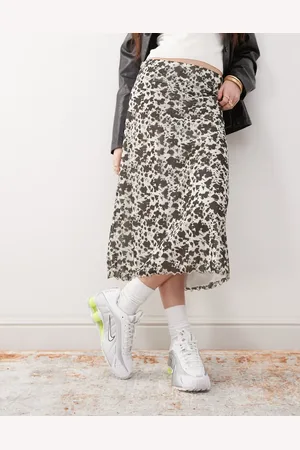 Reclaimed Slinky midi skirt in mini cow print