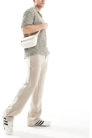 The Couture Club Trousers with split hem in beige