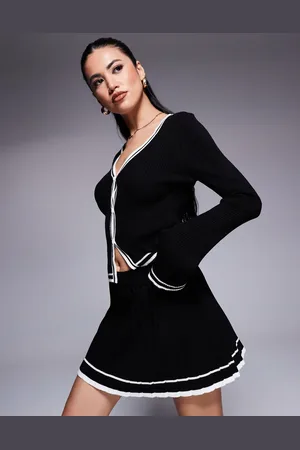 Missyempire Knitted mono contrast piping pleated mini skirt co-ord in