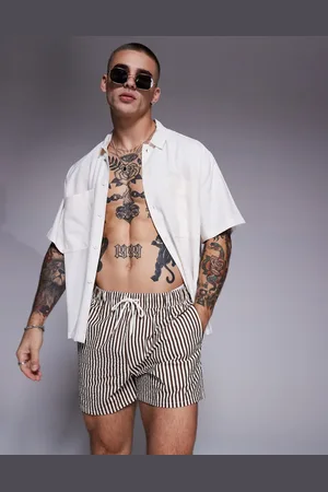 ASOS Seersucker swim shorts in short length in stripe