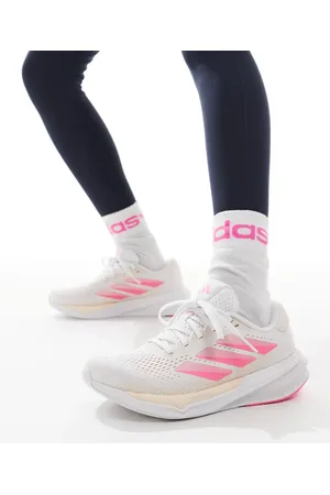 adidas Adidas Running Supernova Stride 2 in peach and pink