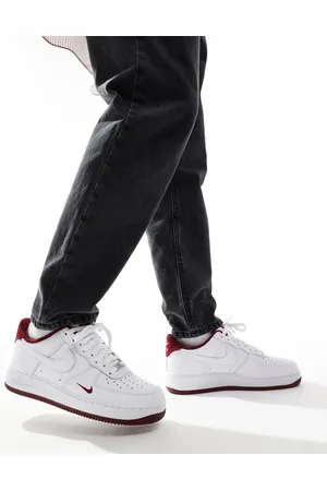 Nike Air Force 1 trainers in white and burgundy