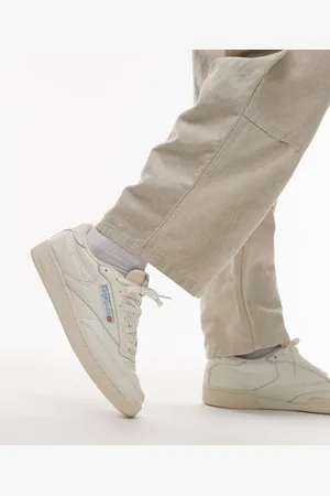 Reebok Club C 85 trainers in off and blue