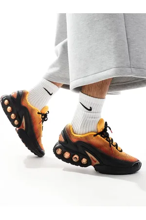 Nike Air Max DN trainers in and orange