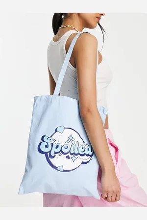 Skinnydip Spoiled slogan tote bag in baby