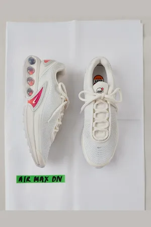 Nike Air Max DN trainers in white and