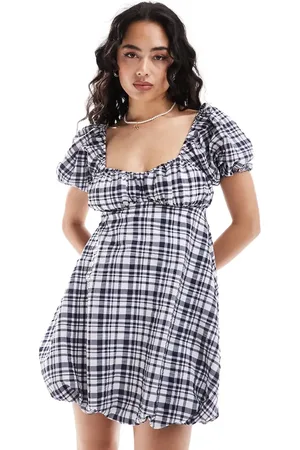 ASOS Puff sleeve mini smock dress with puff ball hem in navy gingham