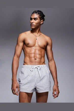 ASOS Seersucker swim shorts in super short length in stripe