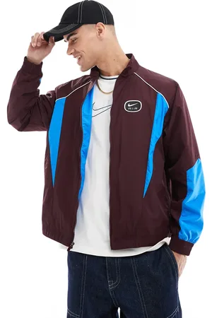 Nike Swoosh Air woven tracktop in and blue