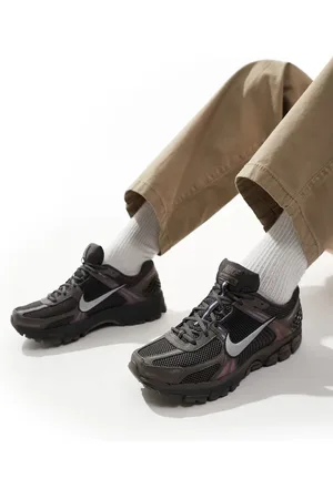 Nike Zoom Vomero 5 trainers in brown and metallic silver