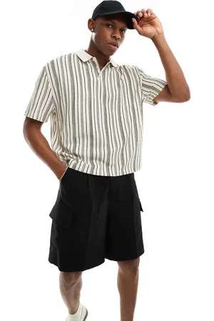 ASOS Boxy relaxed button polo shirt in textured stripe